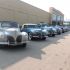 A row of Lincoln-Zephyrs in front of the Lincoln Motor Car Heritage Museum.